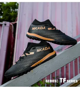 Close-up detail of flyknit TF series soccer shoes featuring a black and orange design