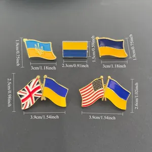 Gedetailleerde afmetingen van Oekraïne, VK en VS vlag emaille reversspelden in cm en inch.