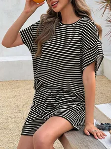 Casual black and white horizontal striped two-piece set featuring short sleeve top and shorts.