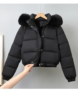 Black women's short puffer jacket with large faux fur collar and quilted design