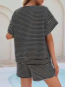 Back view of a chic black and white striped two-piece casual T-shirt and shorts set