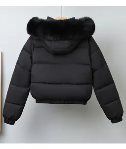 Back view of a black short puffer jacket featuring a thick faux fur collar hood.
