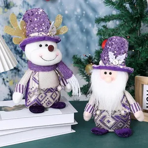 Set di due bambole natalizie in peluche viola con pupazzo di neve e gnomo per casa