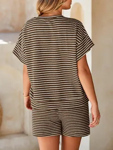 Back view of a women's brown and white striped two-piece loungewear set with soft texture