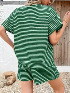 Back view of green and white striped women's casual T-shirt and shorts two-piece set