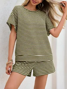 Detailed view of women's striped two-piece set featuring short-sleeve top and shorts