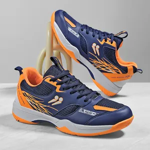 Chaussures de badminton respirantes bleu marine et orange pour tennis et training