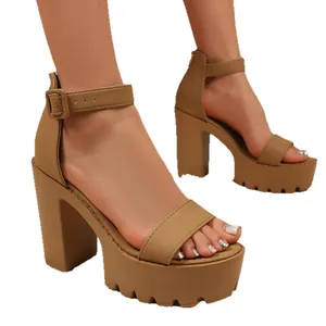 Tan chunky high heel platform sandals with ankle strap and peep toe design
