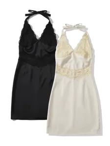 Elegante Mini-Bodycon-Kleider mit Spitzen-Patchwork und Neckholder in Schwarz und Cremeweiß