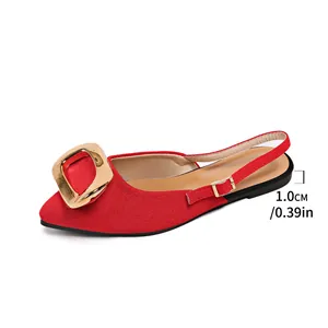 Detail of red pointed toe slingback flat sandals with gold buckle and heel height