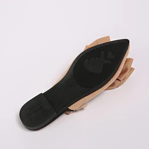 Detail of the anti-slip rubber sole with finger heart pattern on French pointed toe flat sandals