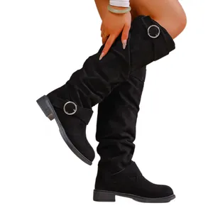 Stylish women's black suede over-the-knee boots with slouchy design and metal buckles.