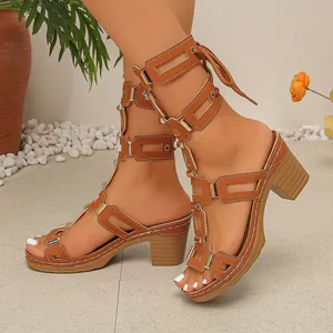Detailed side view of brown gladiator style strap peep toe chunky heel sandals for women