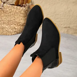 Stylish black pointed-toe Chelsea boots for women with elastic side panels and low heel