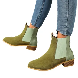 Stylish women's green suede Chelsea boots with elastic side panels and low stacked heel