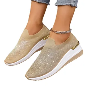 Elegant beige fly-knit wedge sneakers for women featuring sparkling rhinestones and thick white soles
