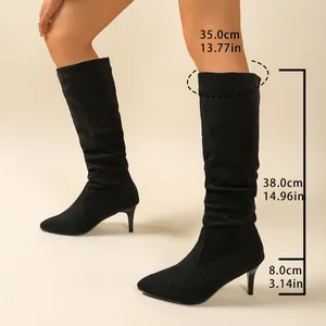 Detailed measurements of black pointed-toe slouchy high-heel boots with stiletto heel