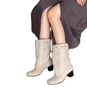 Elegant beige chunky heel mid-calf boots with silver rivets and round toe design for winter