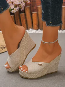 Stylish women's linen texture wedge platform sandals with peep-toe design on model