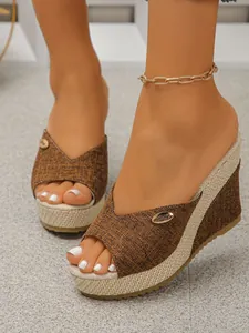 Elegant brown fabric wedge platform slippers with stylish woven straw sole detail
