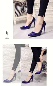 Detail view of elegant blue patent leather pointed-toe stilettos worn by a model