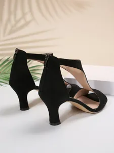 Rear view of black suede kitten heel sandals with functional zipper closure
