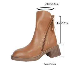 Side view of a brown block heel ankle boot showing shaft height and heel measurements