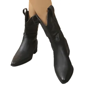 Vintage black mid-calf boots for women featuring a chunky heel and pointed toe design