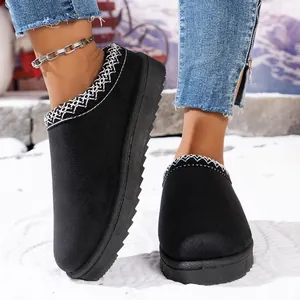 Comfortable women's black platform fleece-lined snow slippers for cold winter days