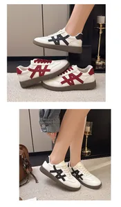 Lifestyle view of women's white platform sneakers with stylish color-block side patterns