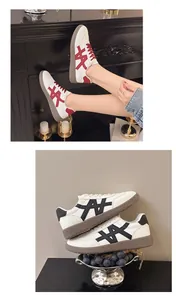 Detail of platform lace-up white sneakers with stylish color-block design elements