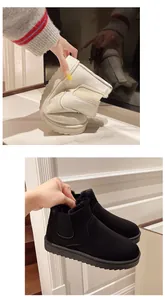 Detailed view showing the flexible sole and warm fur lining of these winter snow boots.