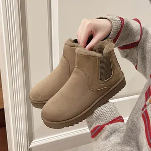 Warm tan women's ankle snow boots with soft faux fur lining and thick non-slip soles.
