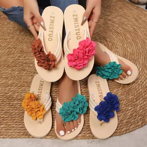 Chanclas de cuña para mujer con grandes flores de tela en varios colores de verano.