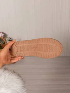 Close-up of the non-slip rubber sole detail for winter comfortable and soft mules