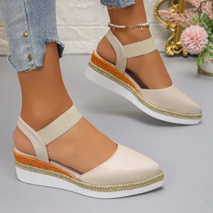 Elegant beige pointed-toe wedge sandals with woven hemp platform and elastic strap