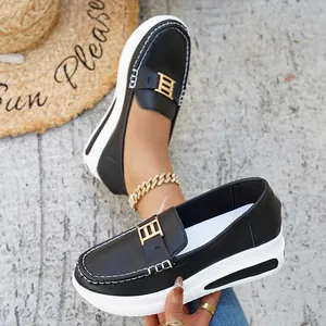 Stylish black PU leather platform loafers for women featuring a gold metal buckle