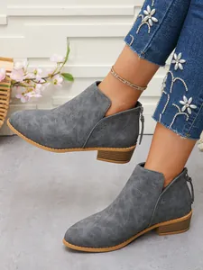 Grey pointed toe chunky heel ankle boots with side cutout and back zipper detail