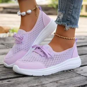 Detailed view of lightweight purple mesh breathable slip-on walking shoes for women