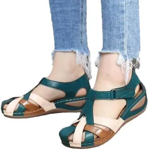 Women's retro hollow-out leather sandals with round toe and cross straps in green and beige
