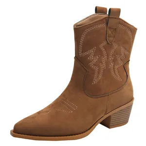 Retro women's brown suede western cowboy boots with chunky heels and pointed toe