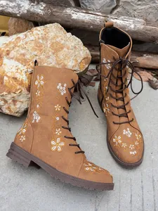 Stylish brown faux suede mid-calf boots featuring elegant floral embroidery for women