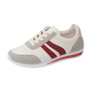 Stylish women's casual running sneakers in off-white with maroon stripes