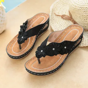 Comfortable wedge flip-flops for women with floral embellishments and rhinestones