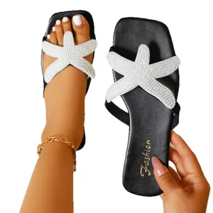 Elegantes sandalias de playa negras para mujer con decoración de estrella de mar de perlas