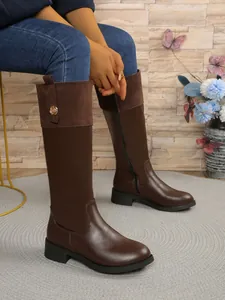 Detailed view of brown leather and suede splicing knight boots with side zipper