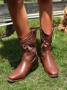 Women's vintage brown Western cowboy boots with hollowed-out embroidery