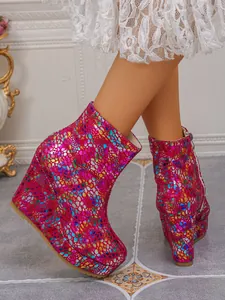 Detailed side view of metallic colorful wedge platform ankle boots with side zipper