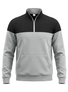 Detailansicht der Steppstruktur an einem grau-schwarzen Sweatshirt mit halbem Reißverschluss