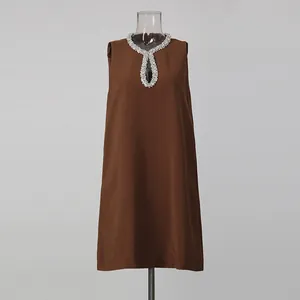 Elegant brown sleeveless straight mini dress with rhinestone keyhole neckline detail